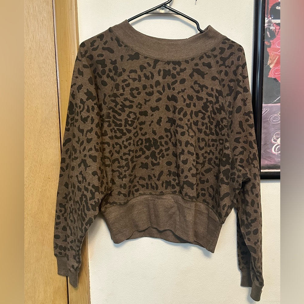 Brown cheetah print sweater.